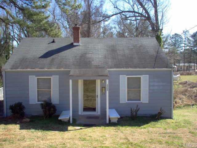 2733 Springhill Avenue Raleigh, NC 27603 - Photo 1 of 1 a view of a house with a yard