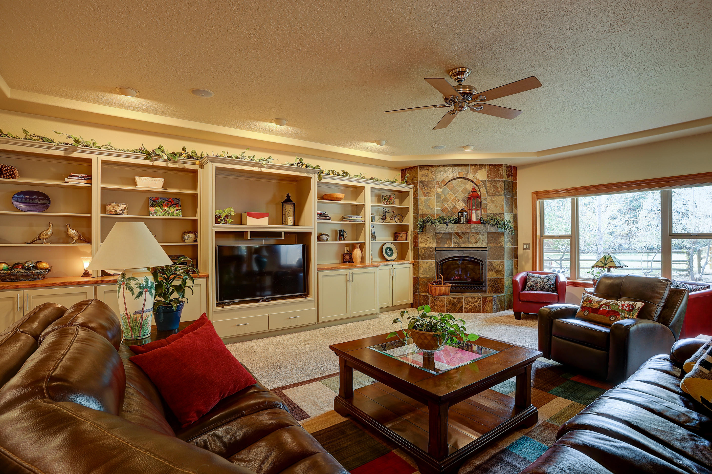 61267 Benham Road Bend, OR 97702 - Photo 7 of 49 Great room with fireplace and built ins