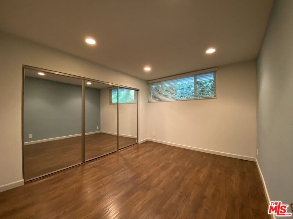 1920 Hillcrest Road, Unit 12 Los Angeles, CA 90068 - Photo 19 of 25 a view of an empty room