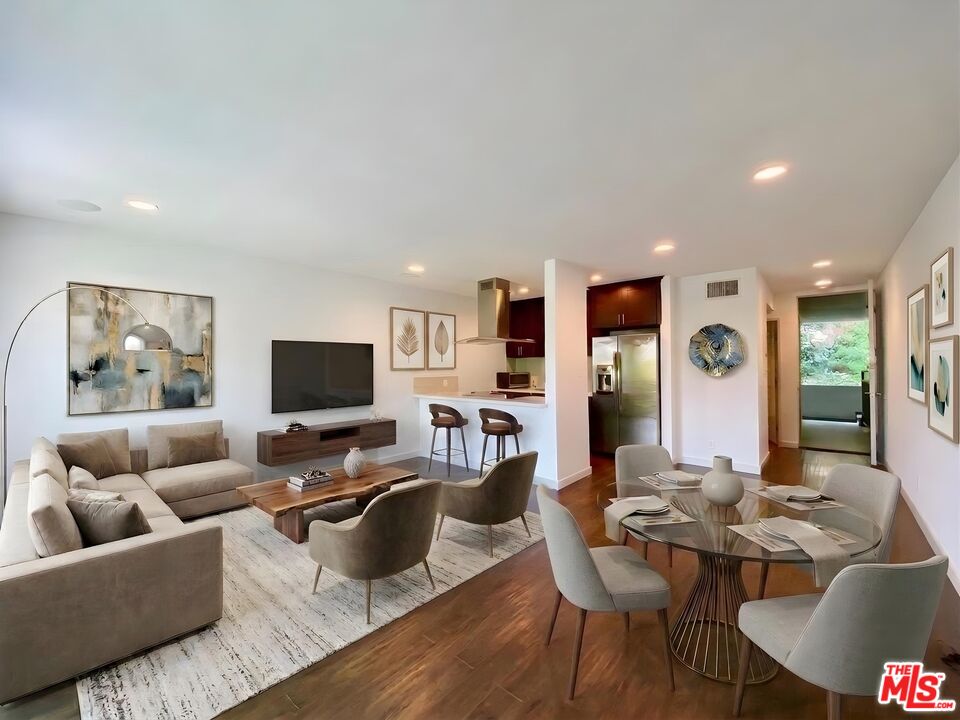 1920 Hillcrest Road, Unit 12 Los Angeles, CA 90068 - Photo 2 of 25 a living room with furniture kitchen view and a window