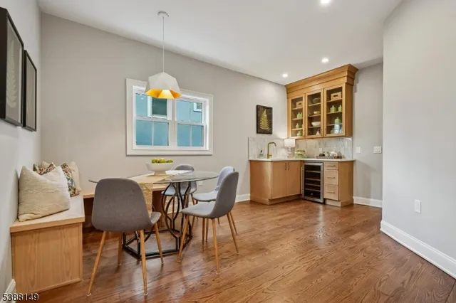 a bedroom with a bed and a table in it