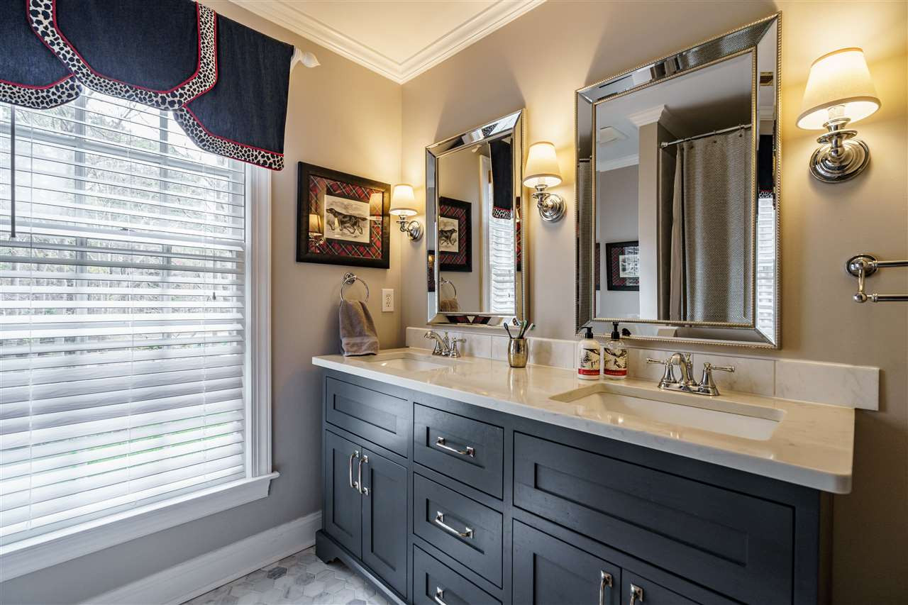 10709 Dunhill Terrace Raleigh, NC 27615 - Photo 21 of 30 Beautifully and tastefully updated bathroom features double vanity. Bathroom