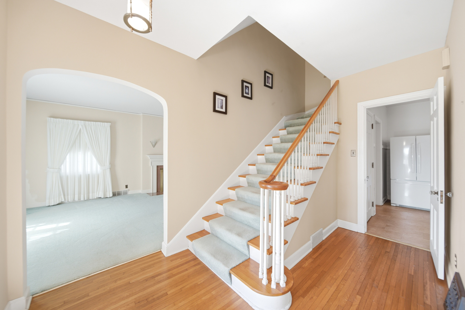 807 East Fellows Street Dixon, IL 61021 - Photo 13 of 31 a view of a hallway view with wooden floor and staircase