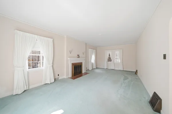 a view of a livingroom with a fireplace