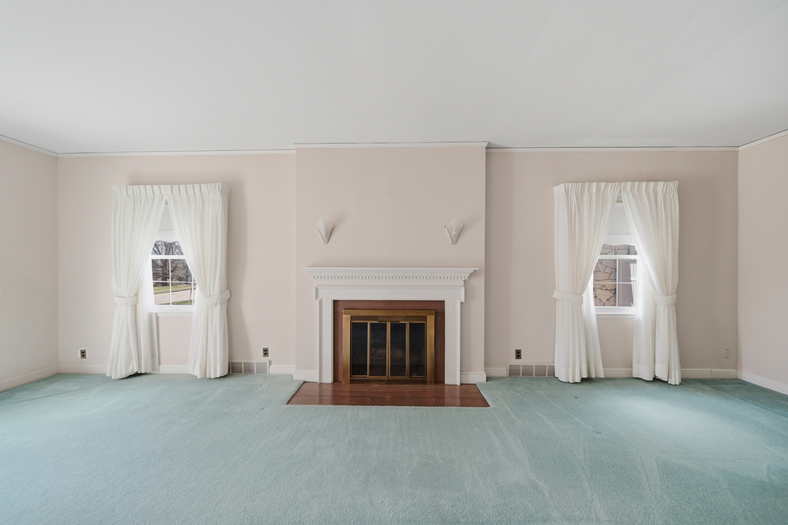 807 East Fellows Street Dixon, IL 61021 - Photo 17 of 31 a view of empty room with a fireplace