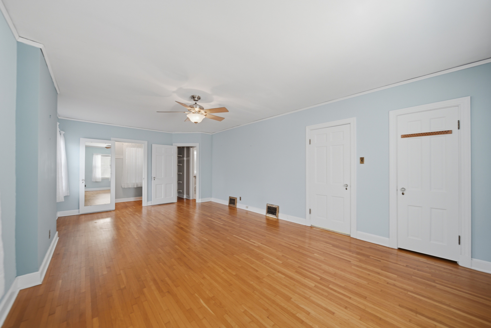 807 East Fellows Street Dixon, IL 61021 - Photo 24 of 31 a view of an empty room with wooden floor and a window