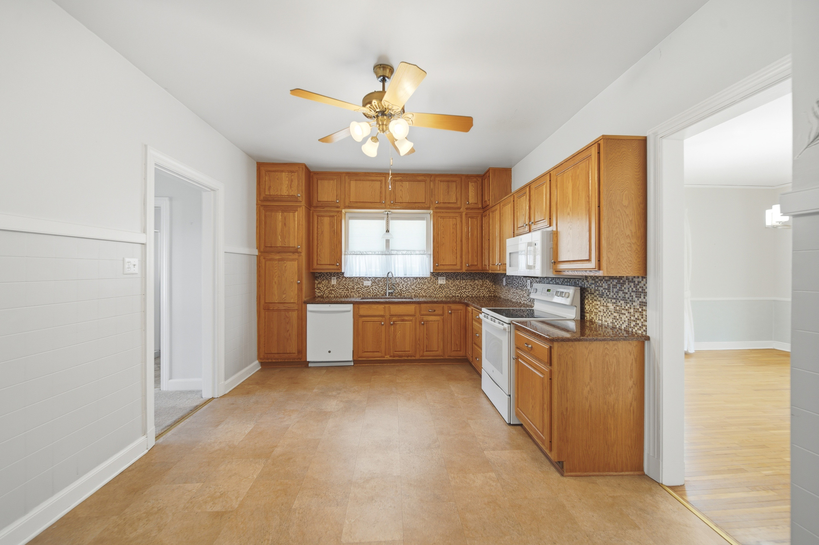 807 East Fellows Street Dixon, IL 61021 - Photo 10 of 31 a kitchen with a refrigerator a sink and dishwasher