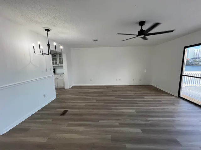 swimming pool view with a seating space