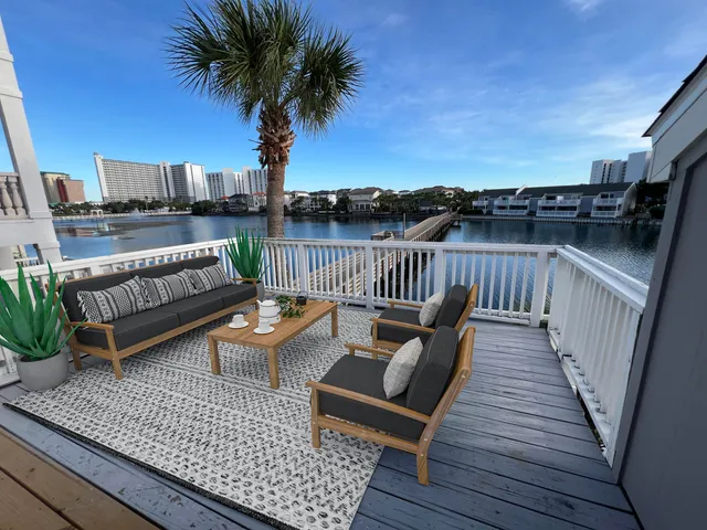 a view of balcony with wooden floor