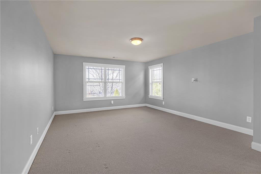2048 Village Crest Drive Northwest Atlanta, GA 30318 - Photo 11 of 21 an empty room with a window