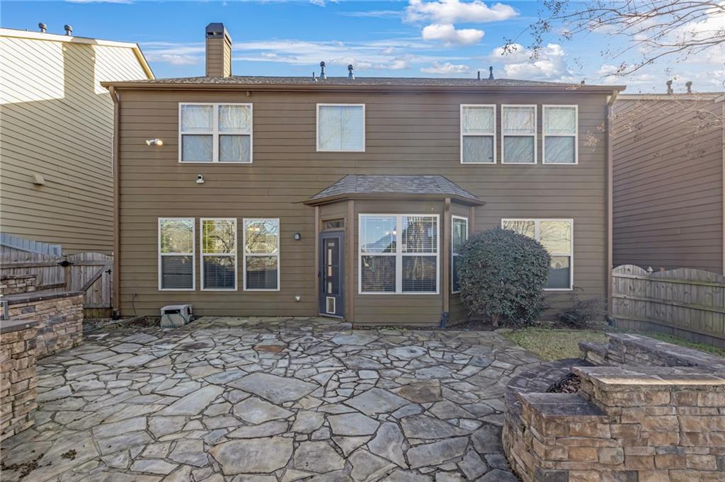 2048 Village Crest Drive Northwest Atlanta, GA 30318 - Photo 20 of 21 a front view of a house with a yard
