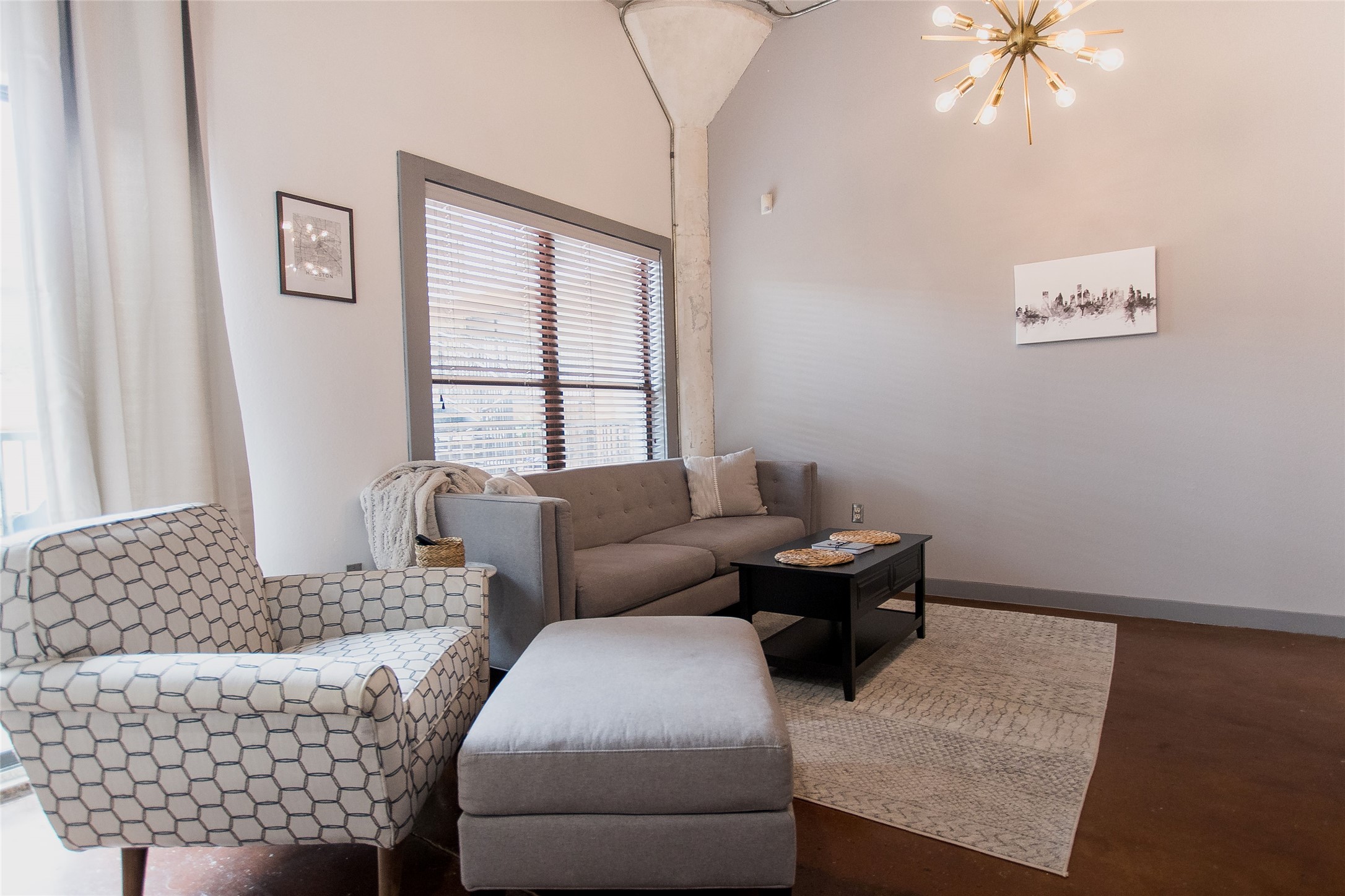2205 McKinney Street, Unit 309 Houston, TX 77003 - Photo 4 of 14 a living room with furniture and window