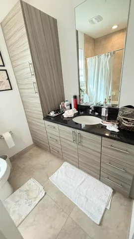 a bathroom with a bathtub and a sink