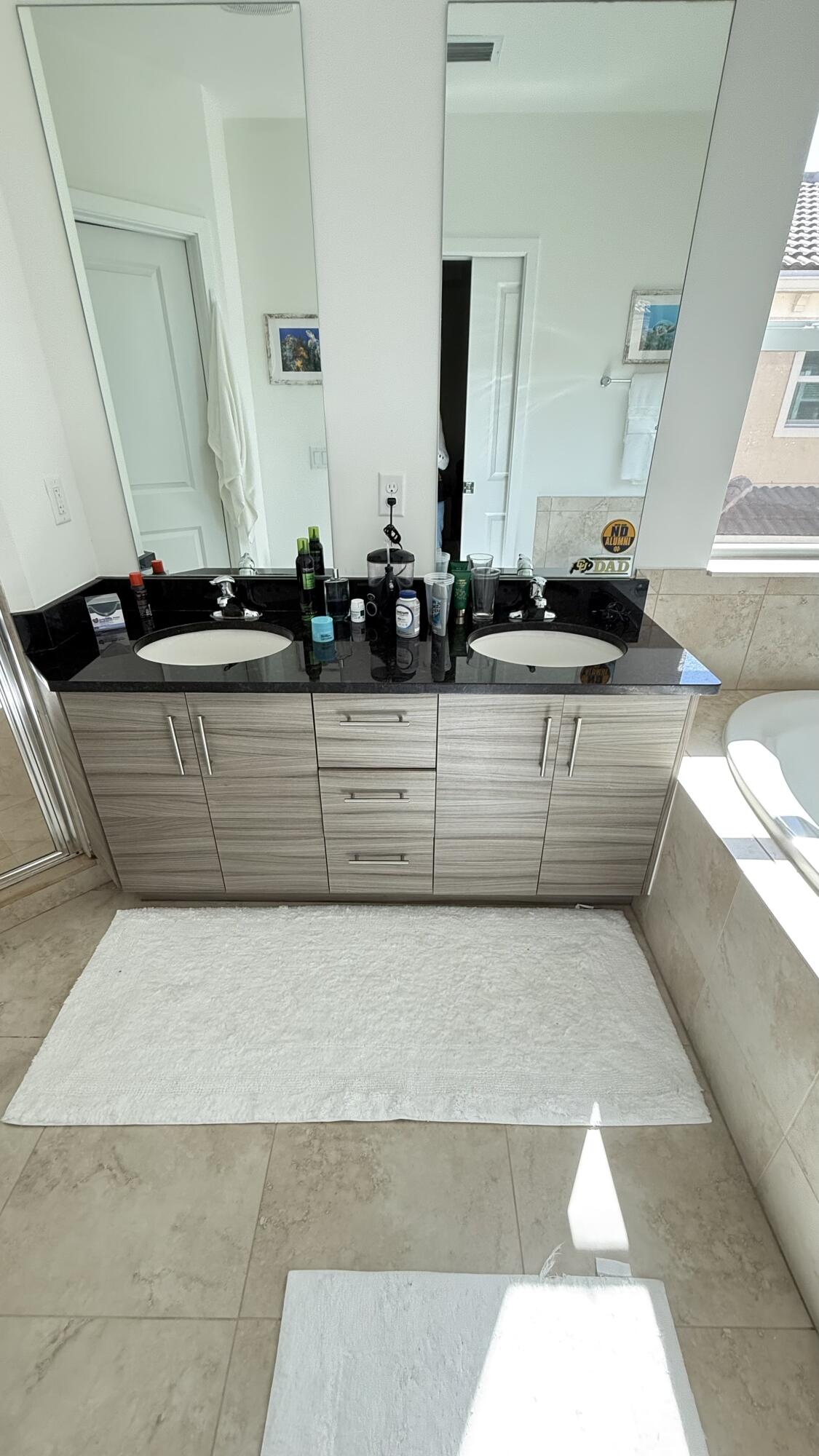 Undisclosed Address Hobe Sound, FL 33455 - Photo 17 of 20 a bathroom with a bathtub and a sink