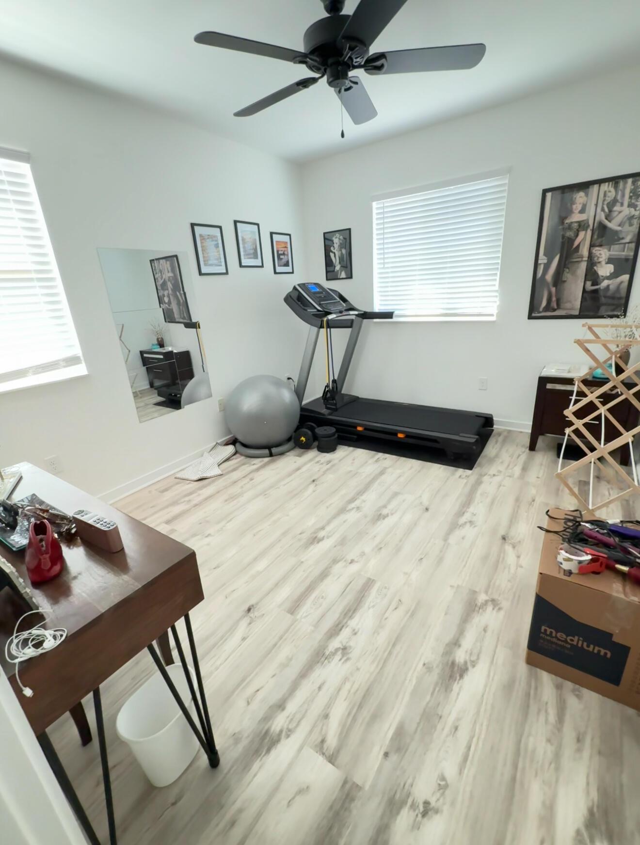 Undisclosed Address Hobe Sound, FL 33455 - Photo 18 of 20 a bedroom with a bed and wooden floor