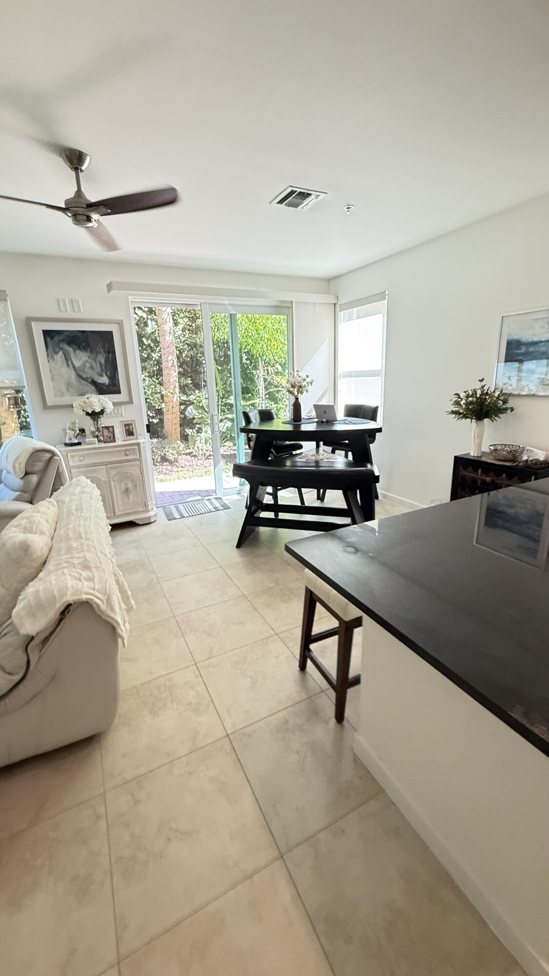 Undisclosed Address Hobe Sound, FL 33455 - Photo 6 of 20 a living room with furniture and a flat screen tv