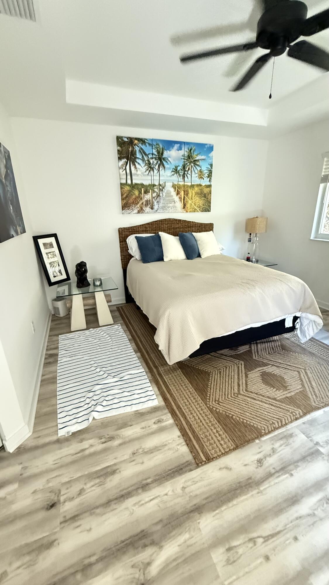 Undisclosed Address Hobe Sound, FL 33455 - Photo 10 of 20 a bedroom with a bed and a large window