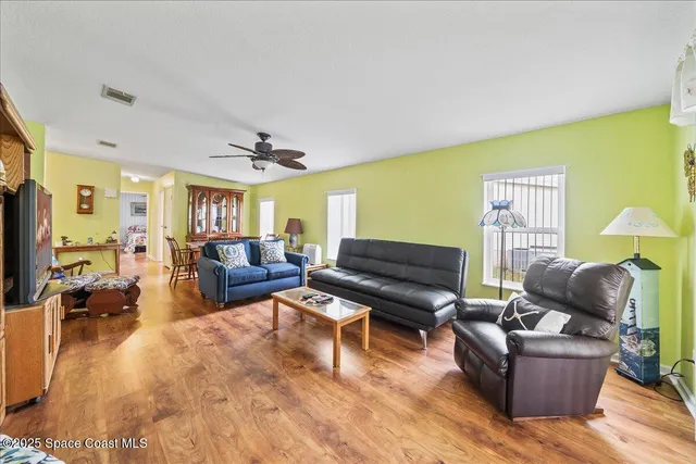 a living room with furniture and a couch