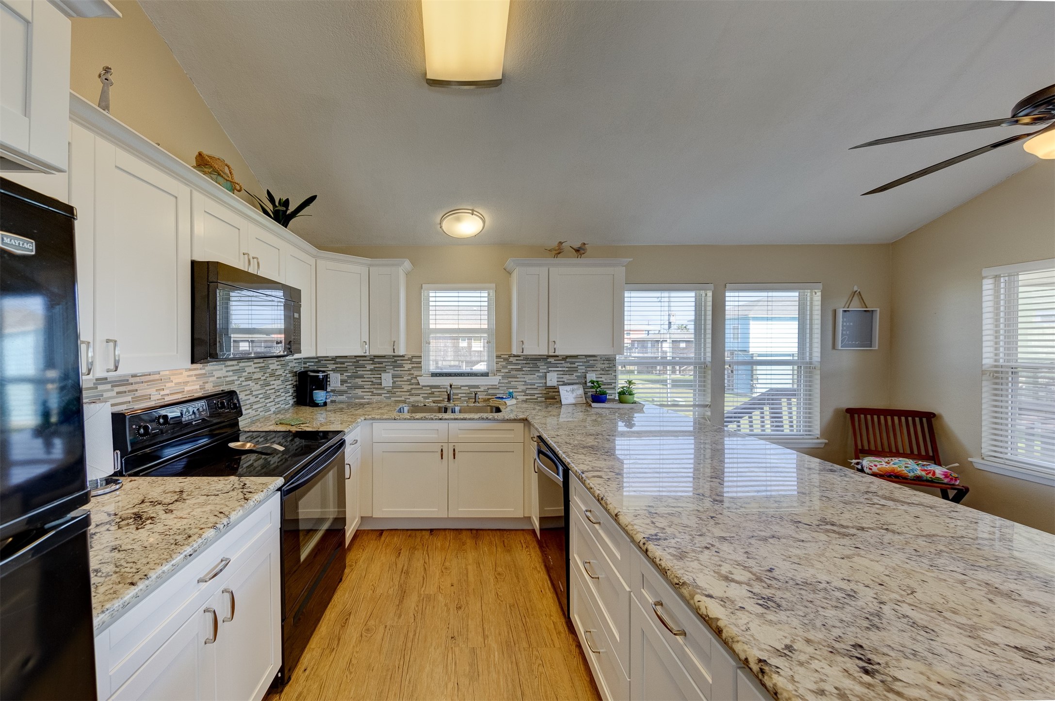 23005 Fresca Street Galveston, TX 77554 - Photo 16 of 37 a large kitchen with lot of counter top space