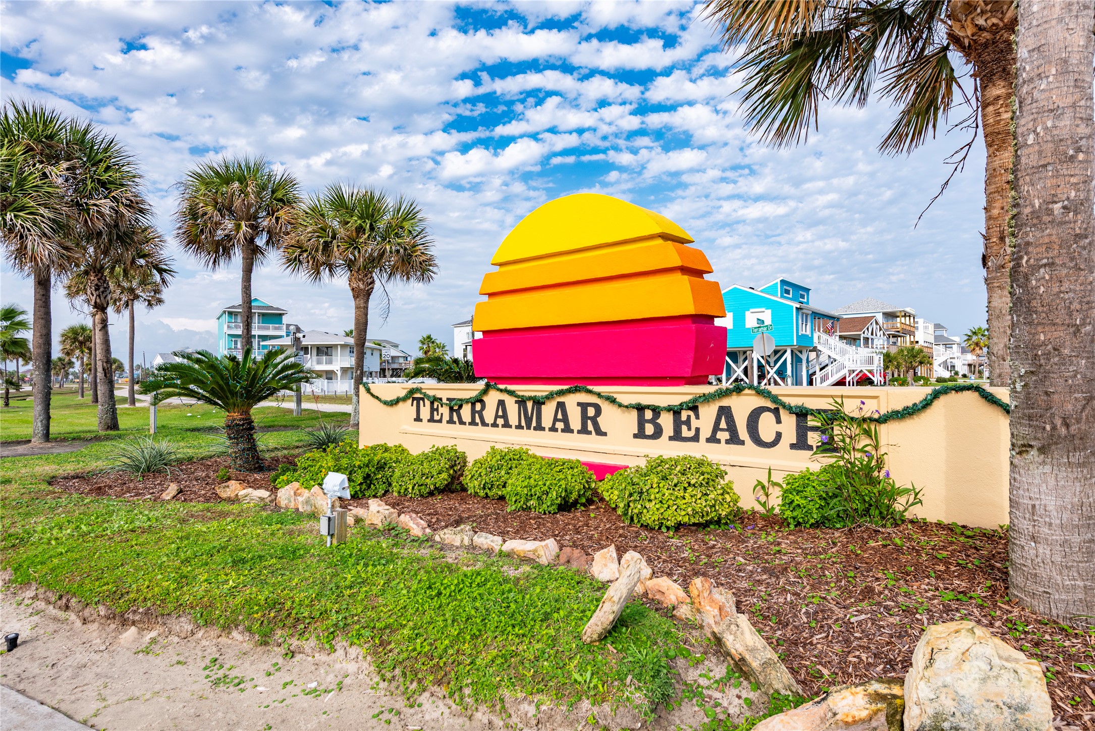 23005 Fresca Street Galveston, TX 77554 - Photo 37 of 37 a sign that is on the side of the road