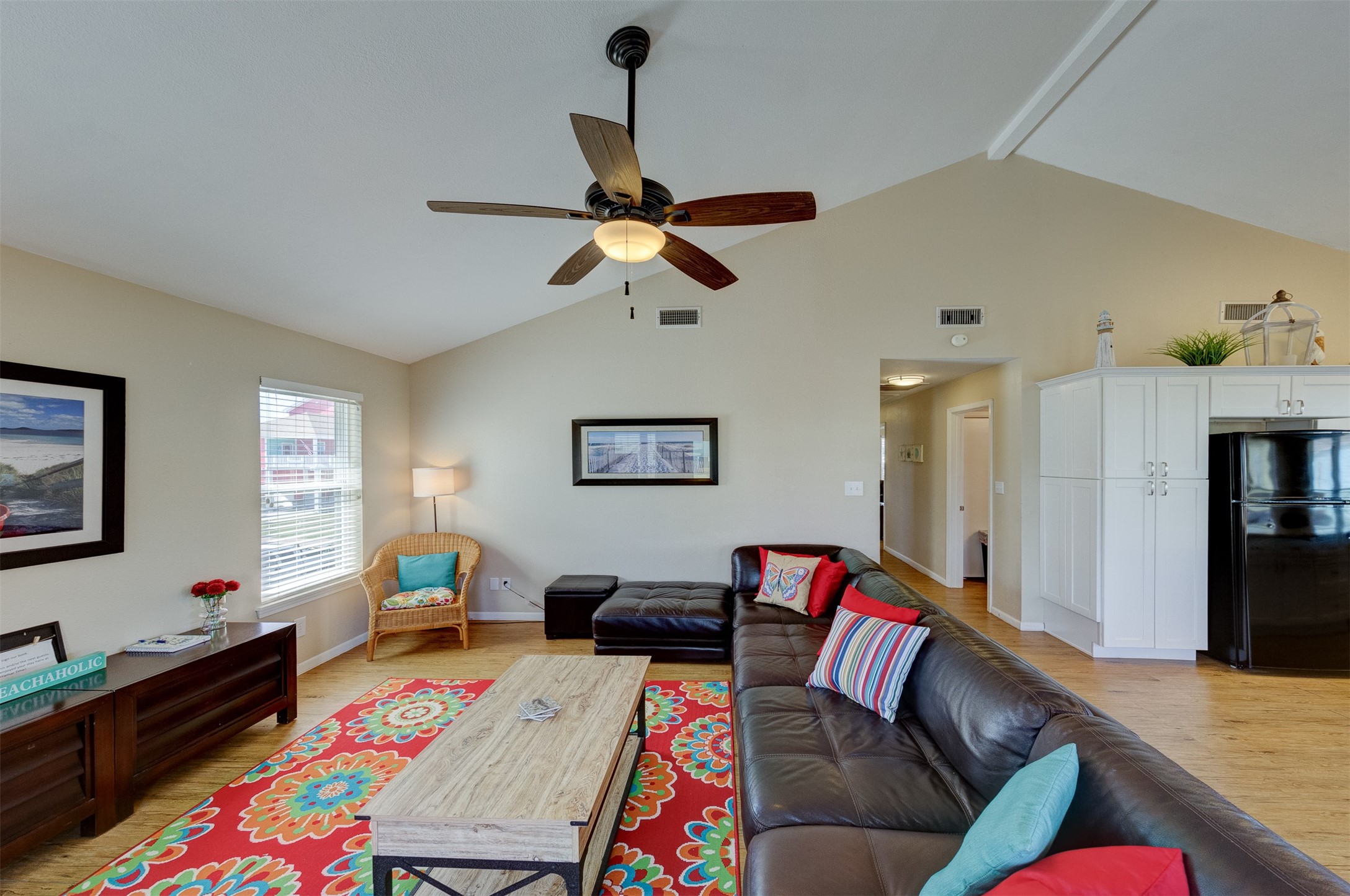 23005 Fresca Street Galveston, TX 77554 - Photo 7 of 37 a living room with furniture and a flat screen tv