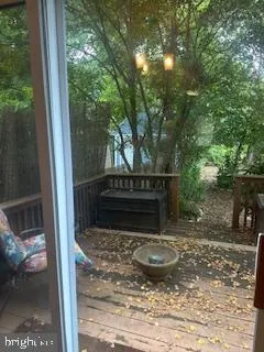 a view of house with backyard