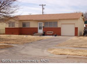 5202 Parker Street Amarillo, TX 79110 - Photo 1 of 1 a front view of a house with a outdoor space