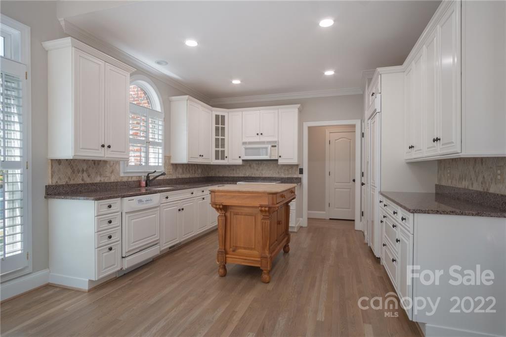 2900 Sliding Rock Trail Fort Mill, SC 29708 - Photo 11 of 41 a kitchen with cabinets a sink and appliances