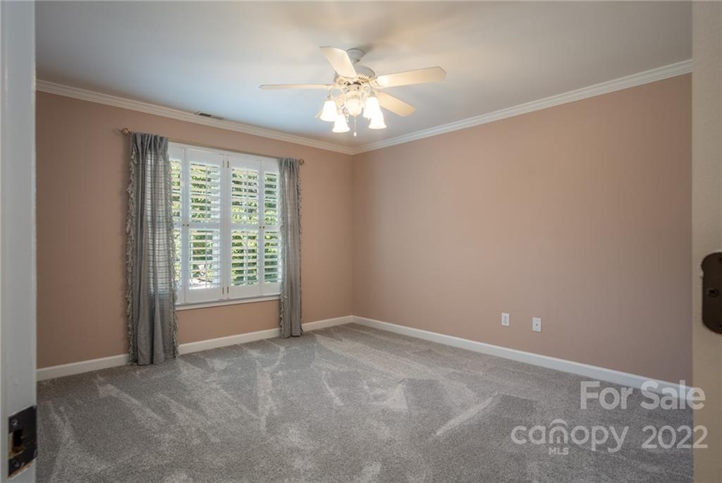 2900 Sliding Rock Trail Fort Mill, SC 29708 - Photo 18 of 41 an empty room with a ceiling fan and window