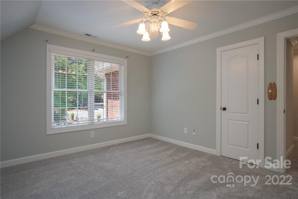 2900 Sliding Rock Trail Fort Mill, SC 29708 - Photo 19 of 41 an empty room with windows and fan