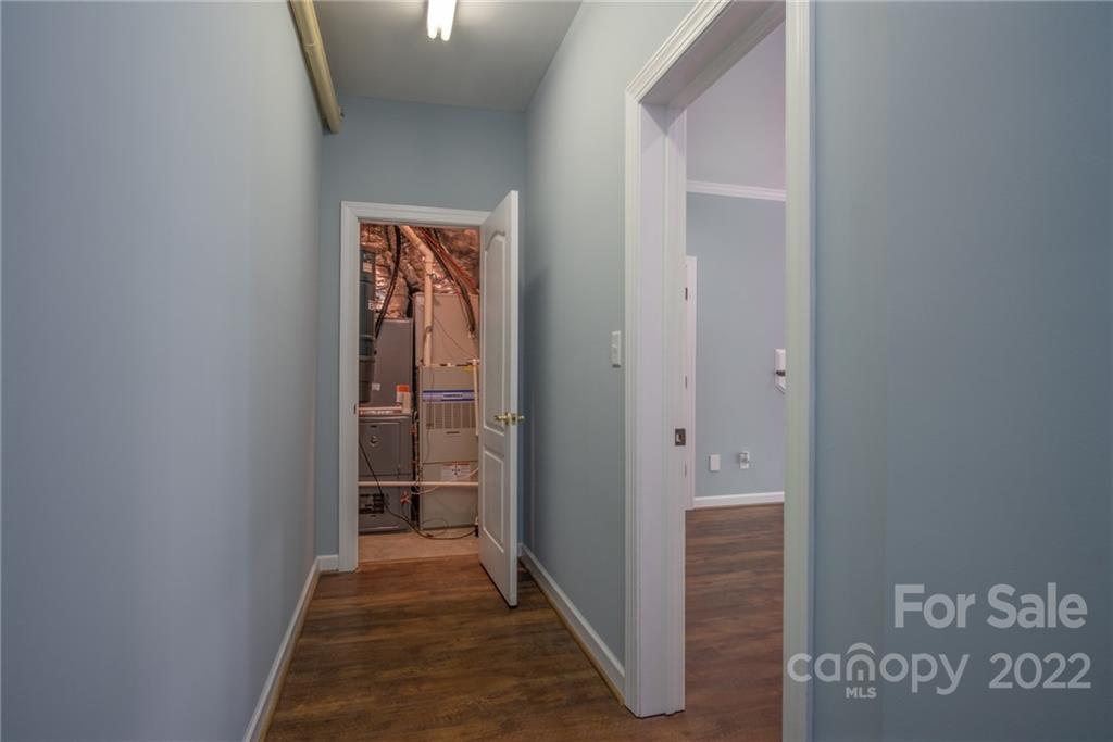2900 Sliding Rock Trail Fort Mill, SC 29708 - Photo 23 of 41 a view of a hallway with wooden floor