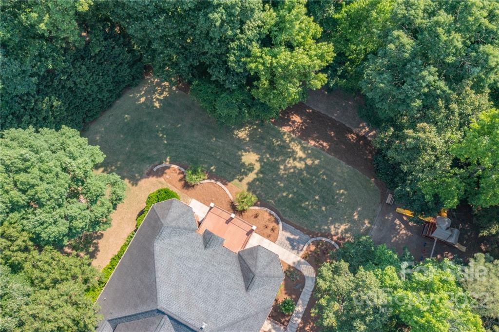 2900 Sliding Rock Trail Fort Mill, SC 29708 - Photo 36 of 41 a view of a lake in a forest