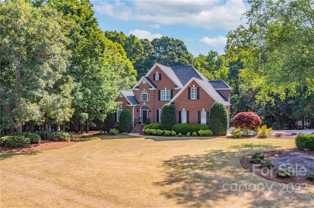 2900 Sliding Rock Trail Fort Mill, SC 29708 - Photo 4 of 41 a front view of a house with a yard