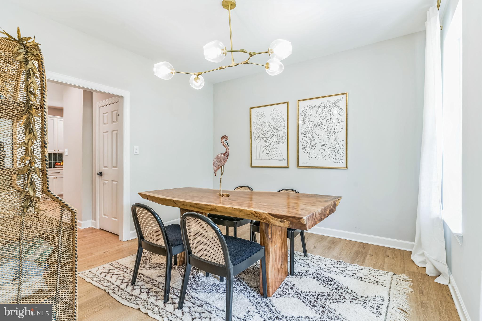 14720 Locust Court Issue, MD 20645 - Photo 15 of 41 a view of a dining room with furniture and wooden floor