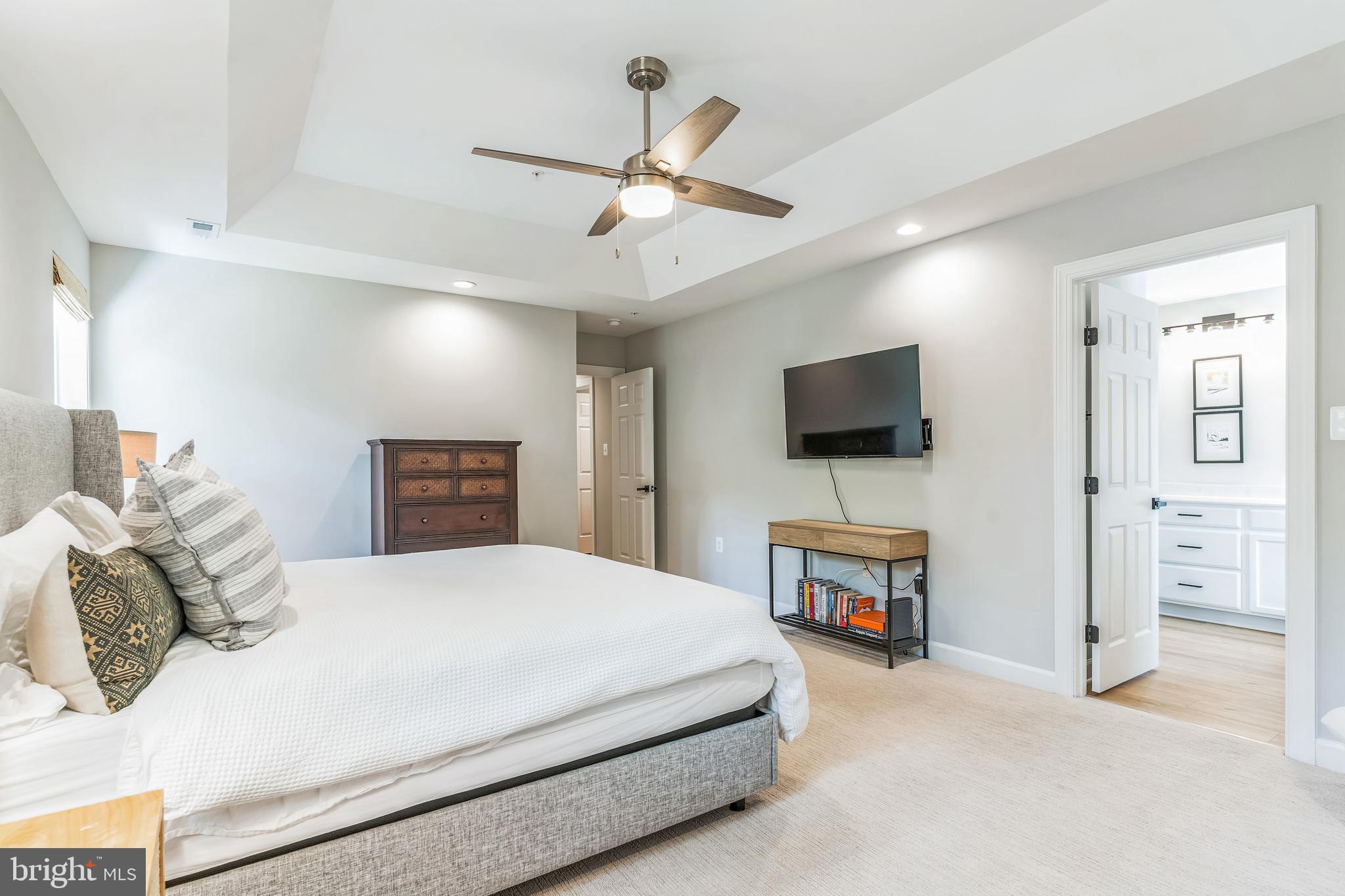 14720 Locust Court Issue, MD 20645 - Photo 26 of 41 a bedroom with a bed and a flat screen tv