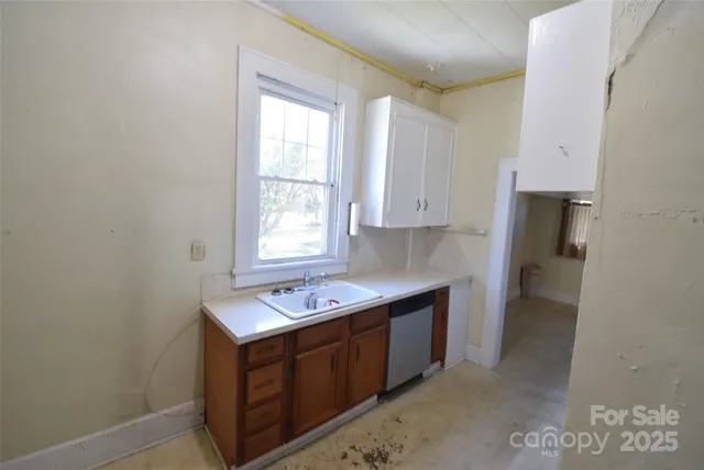 a view of kitchen and utility room