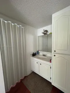 a view of a swimming pool with a garden