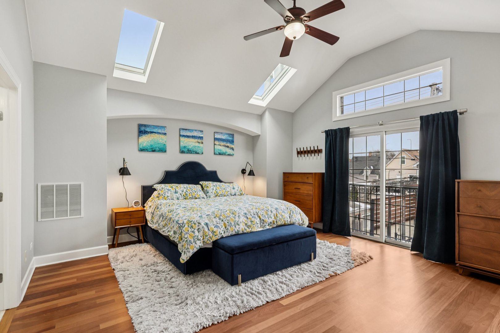 3137 North Spaulding Avenue Chicago, IL 60618 - Photo 13 of 42 a spacious bedroom with a large bed and a window