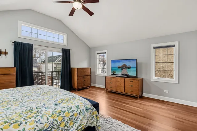 a bathroom with a granite countertop double vanity sink and a mirror