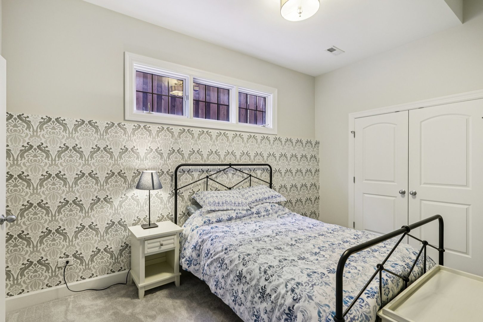 3137 North Spaulding Avenue Chicago, IL 60618 - Photo 28 of 42 a bedroom with a bed and a wall painting