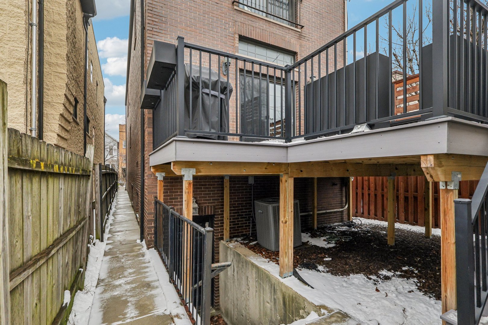 3137 North Spaulding Avenue Chicago, IL 60618 - Photo 36 of 42 a view of a house with wooden fence