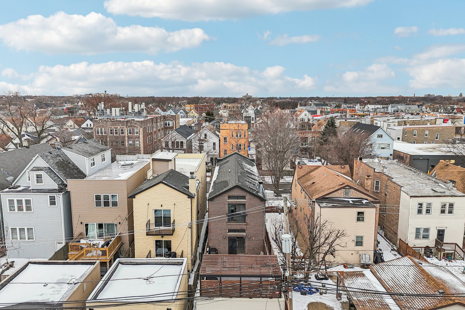 3137 North Spaulding Avenue Chicago, IL 60618 - Photo 38 of 42 a view of a city with buildings