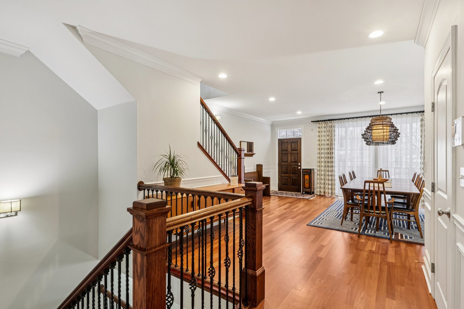 3137 North Spaulding Avenue Chicago, IL 60618 - Photo 4 of 42 a view of a livingroom with furniture wooden floor and stairs