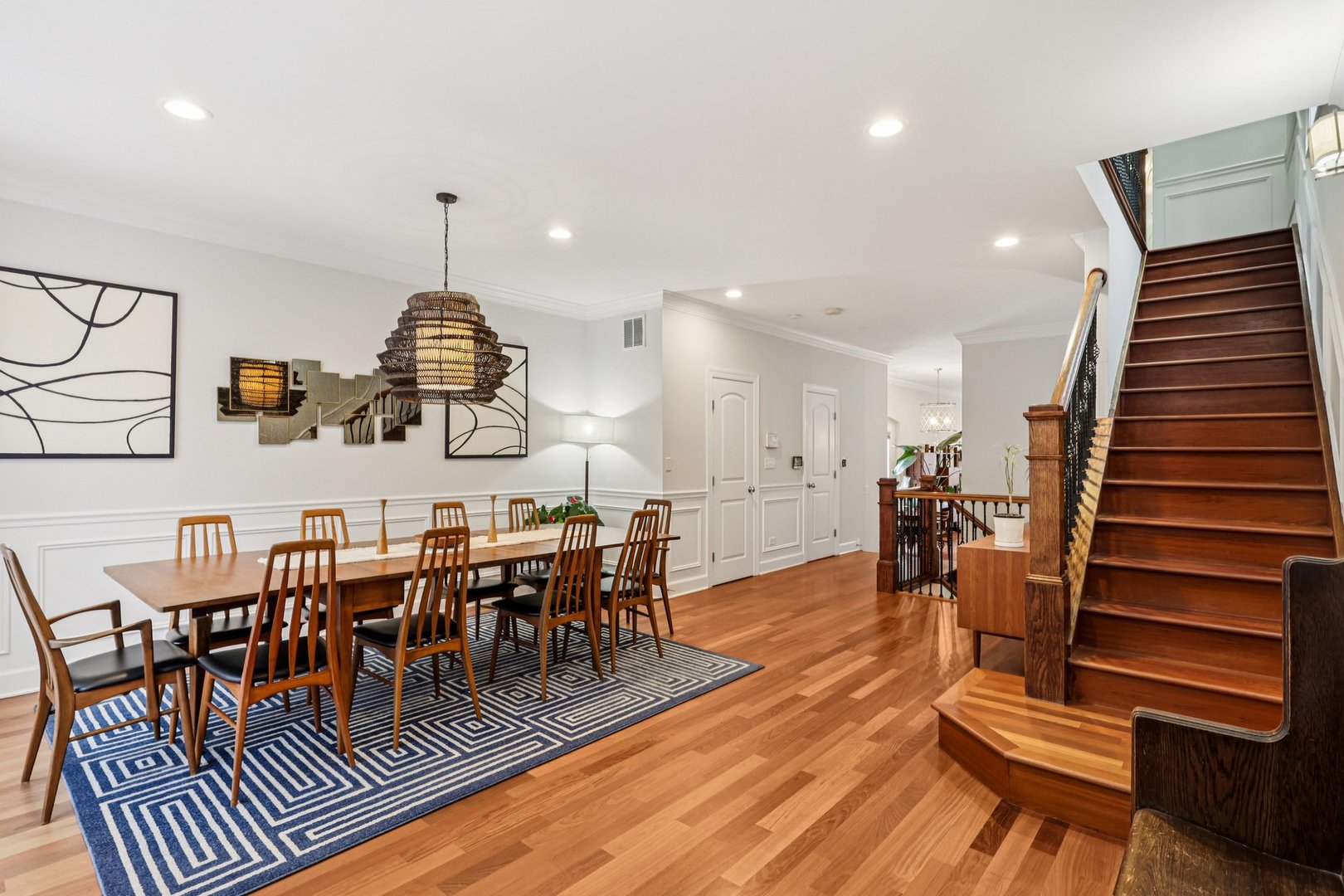 3137 North Spaulding Avenue Chicago, IL 60618 - Photo 5 of 42 an open kitchen with dining table and sink