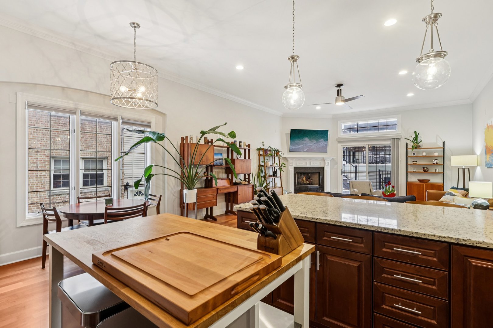 3137 North Spaulding Avenue Chicago, IL 60618 - Photo 8 of 42 a view of a dining room with furniture window and wooden floor
