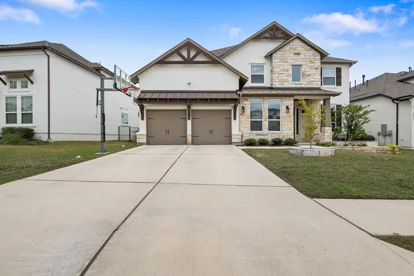 a view of house and outdoor space with yard