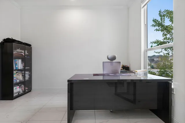 a living room with fireplace furniture and a fireplace
