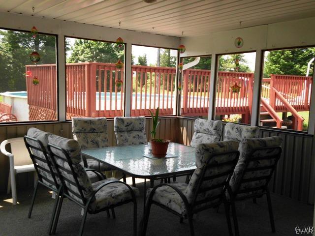 266 Correll Road Kunkletown, PA 18058 - Photo 3 of 24 a view of an outdoor dining space with a table and chairs