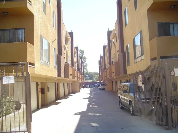 a view of a street with buildings