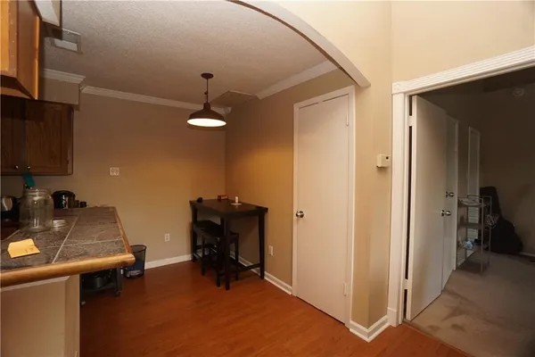 a view of a workspace with furniture